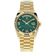 Rolex Day-Date 36 in 18K yellow gold with a malachite dial