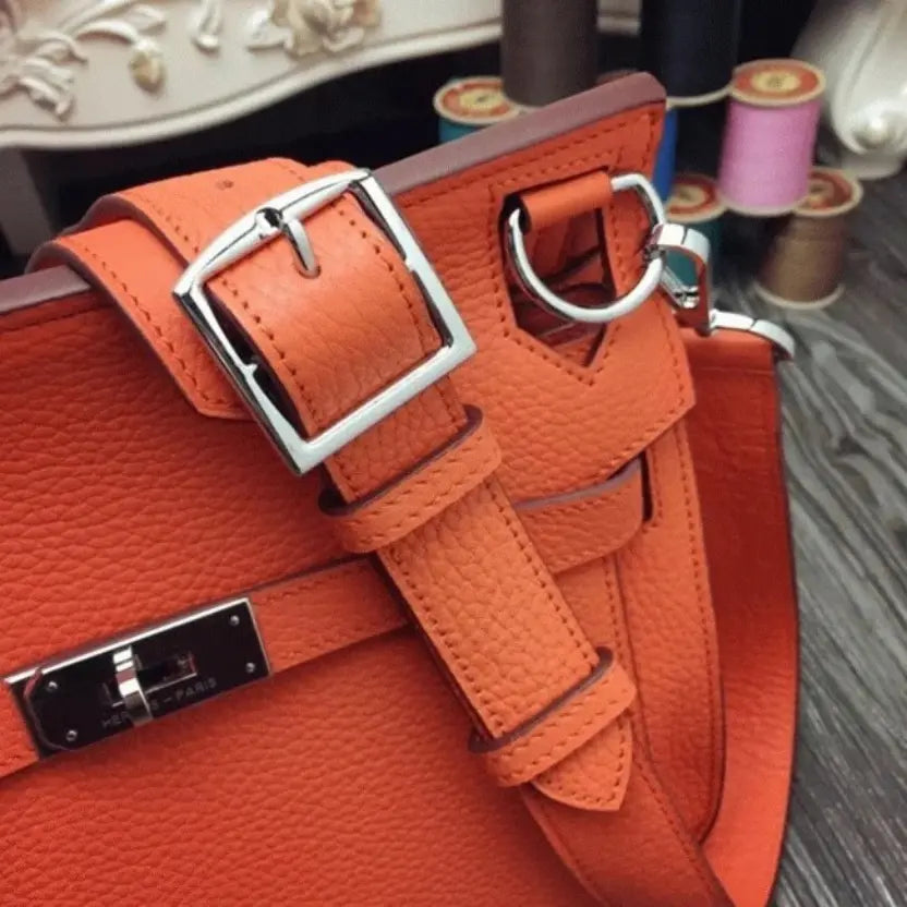 Boutique Quality || Orange Hermes Jypsiere 31cm Handbag
