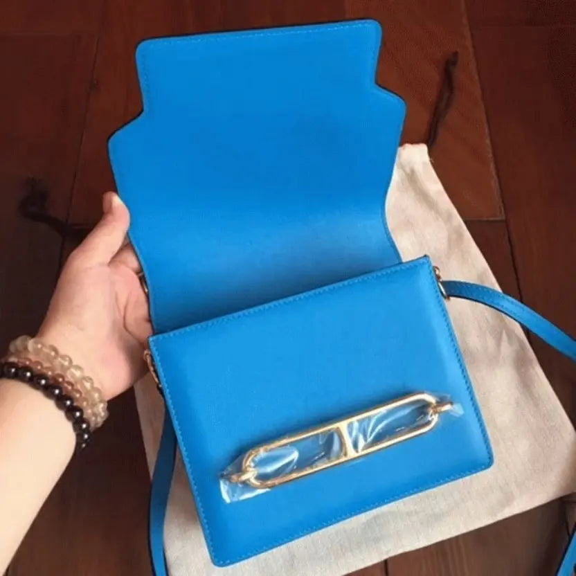 Boutique Quality || Blue hydra luxury Hermes Mini Sac Roulis handbag