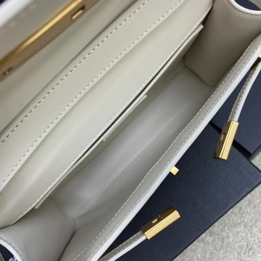 Boutique Quality || YSL White Baguette Bag