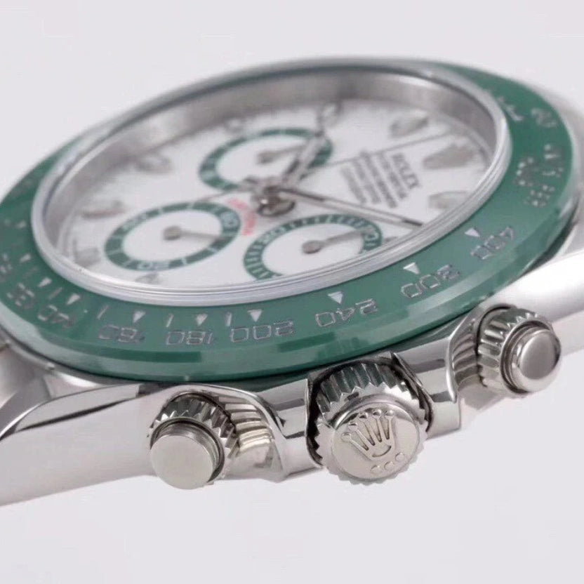 Rolex Cosmograph Daytona with a white dial and a green bezel