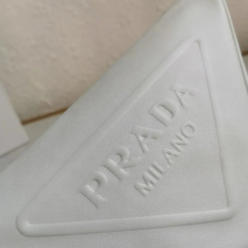 Boutique Quality || Prada Triangle Shoulder Bag in White