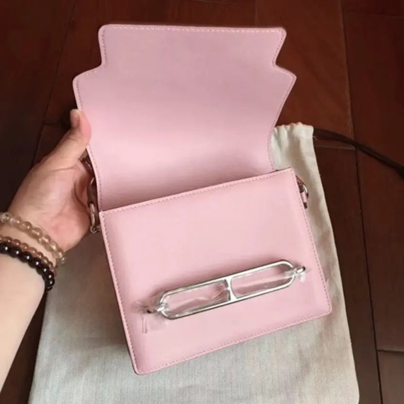 Boutique Quality || Rose dragee Hermes Mini Sac Roulis handbag