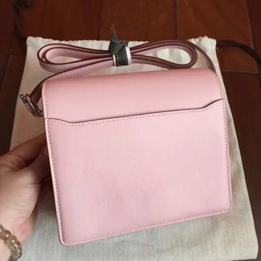 Boutique Quality || Rose dragee Hermes Mini Sac Roulis handbag