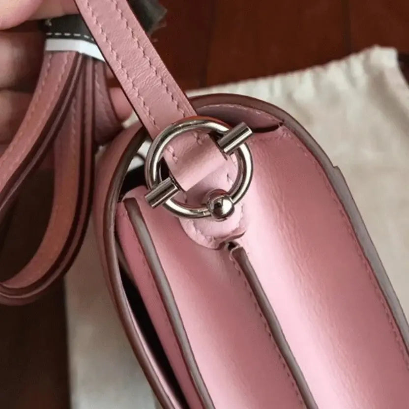 Boutique Quality || Rose dragee Hermes Mini Sac Roulis handbag