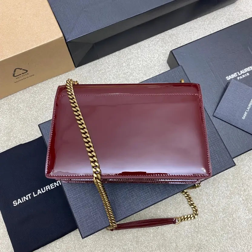 Boutique Quality || YSL Maroon lacquer/Antique gold , Leather Sunset Bag