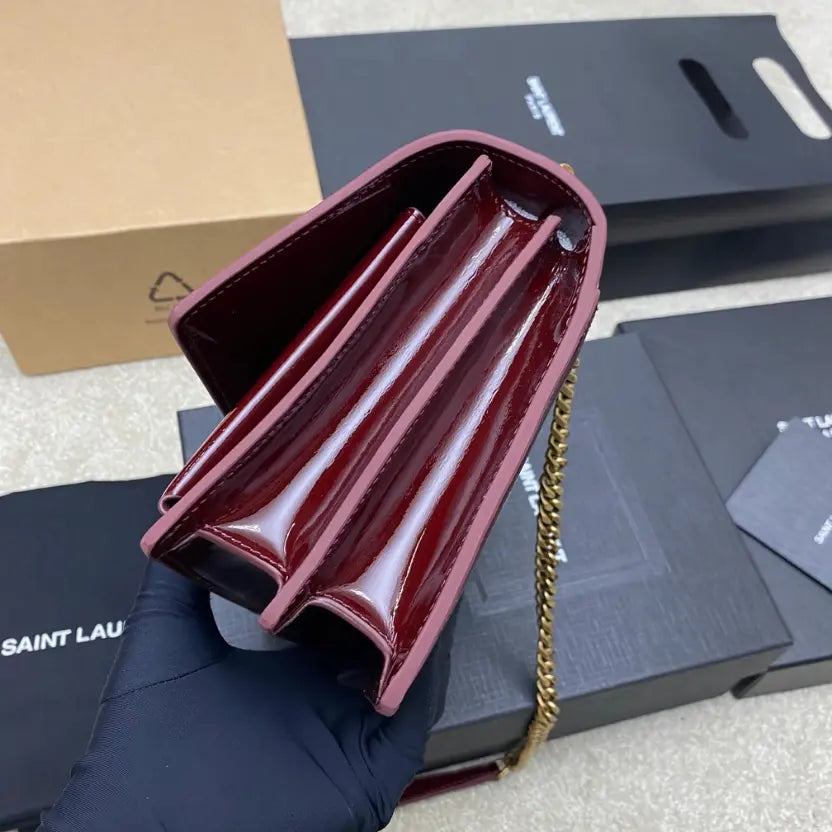 Boutique Quality || YSL Maroon lacquer/Antique gold , Leather Sunset Bag