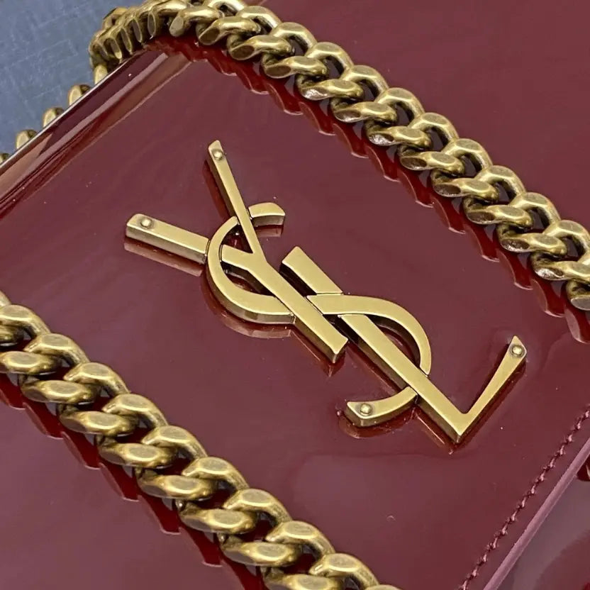 Boutique Quality || YSL Maroon lacquer/Antique gold , Leather Sunset Bag