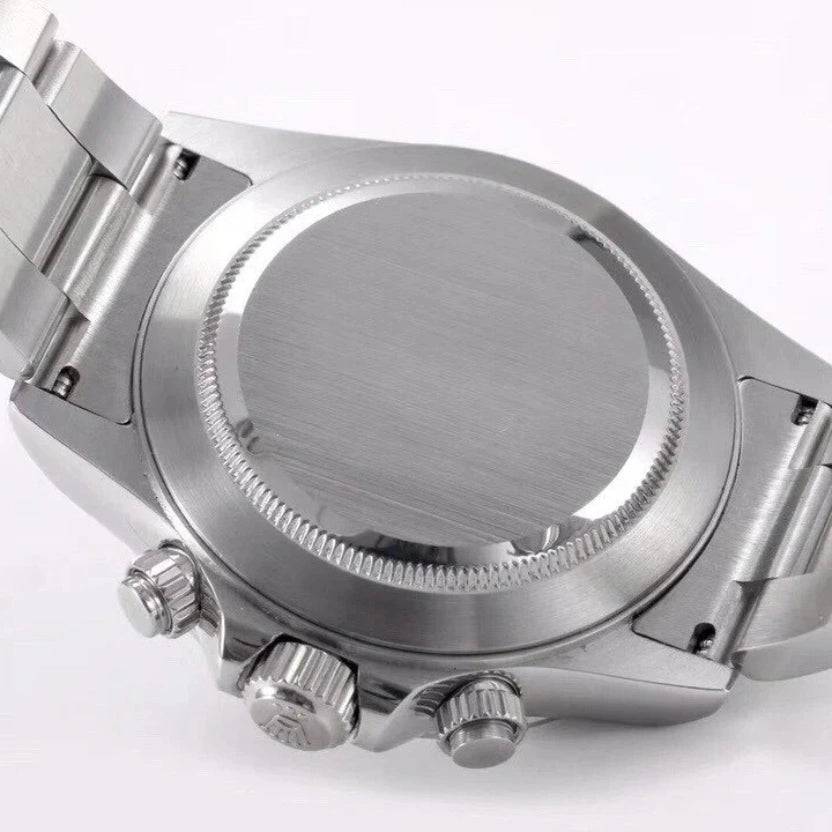 Rolex Cosmograph Daytona with a white dial and a green bezel