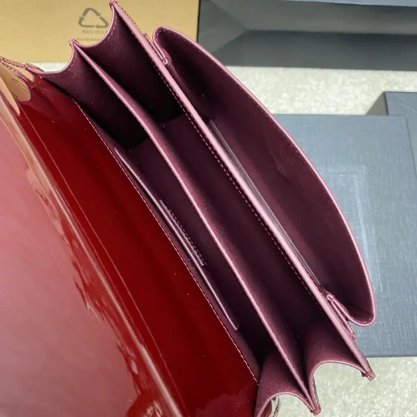 Boutique Quality || YSL Maroon lacquer/Antique gold , Leather Sunset Bag